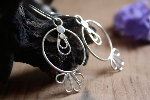 Toltec sun, pre-Hispanic earrings in silver