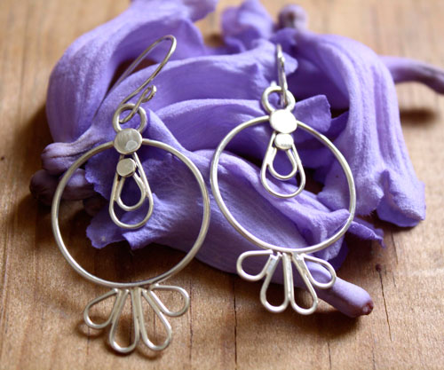Toltec sun, pre-Hispanic earrings in silver