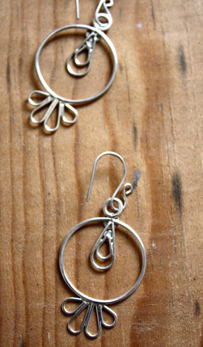 Toltec sun, pre-Hispanic earrings in silver