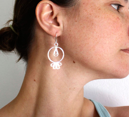 Toltec sun, pre-Hispanic earrings in silver