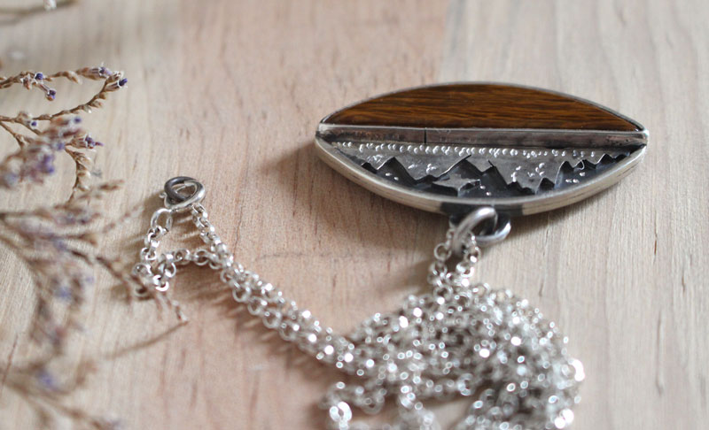 Towards the heavens, mountain eagle necklace in sterling silver and petrified wood