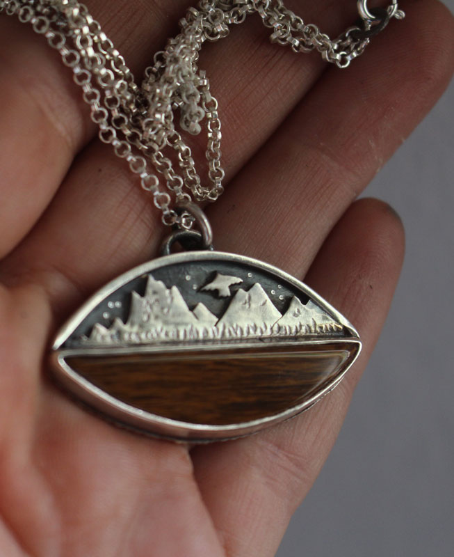 Towards the heavens, mountain eagle necklace in sterling silver and petrified wood