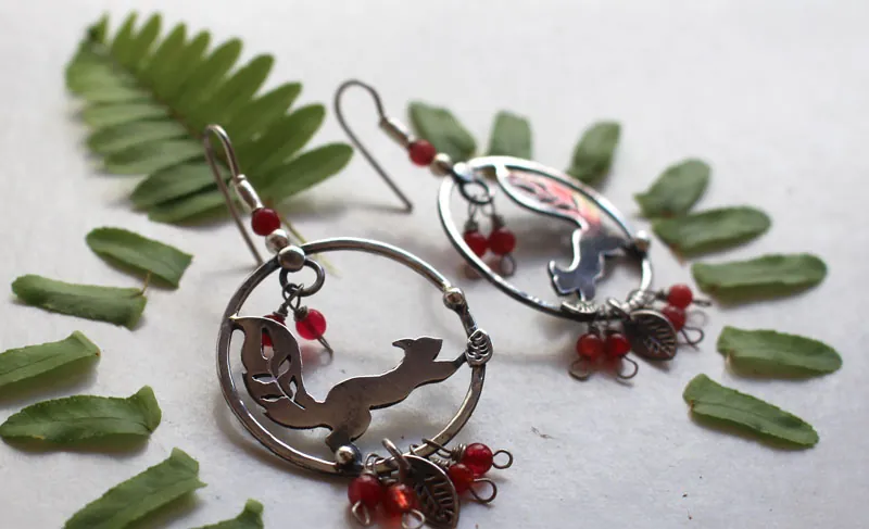 Under the berries, squirrel and red berry earrings in silver and coral