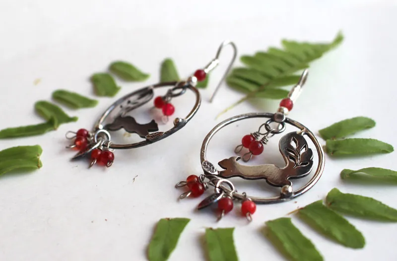 Under the berries, squirrel and red berry earrings in silver and coral