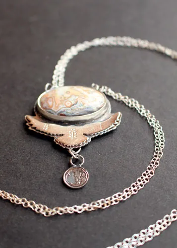 Unfold your wings, eagle bearing a moon necklace in silver and Mexican Crazy Lace agate