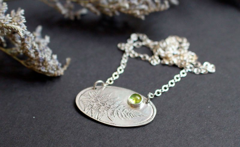 Undergrowth perfume, fern sterling silver necklace and peridot