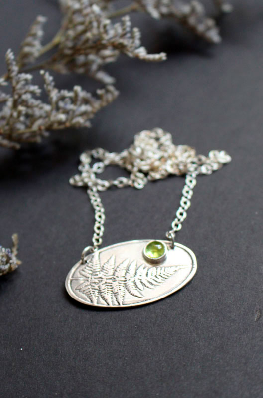 Undergrowth perfume, fern sterling silver necklace and peridot