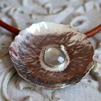 Water lily in the rain, aquatic leaf necklace in silver and sapphire