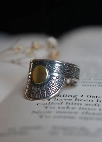 When the sun comes to kiss the sea, tribal ring in silver and brass