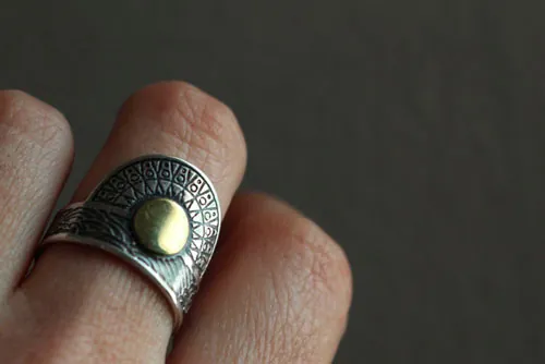 When the sun comes to kiss the sea, tribal ring in silver and brass