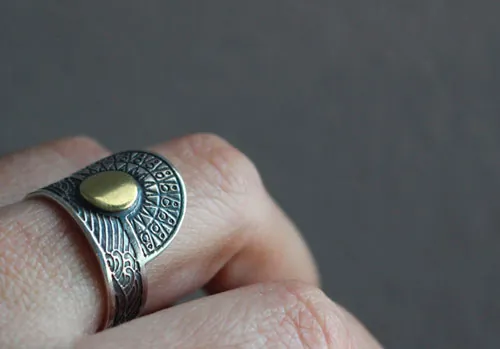 When the sun comes to kiss the sea, tribal ring in silver and brass