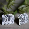 Stud earrings with a date of the Tzolkin calendar