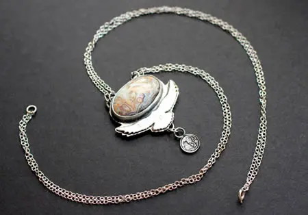 Unfold your wings necklace with an eagle, representing freedom, clear vision, and celestial power among the Celts