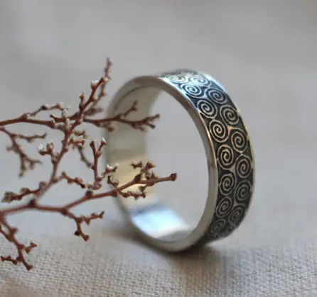 Triskel ring inspired by the Celtic motif