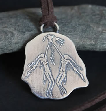 Necklace reproduction of an aboriginal rock painting