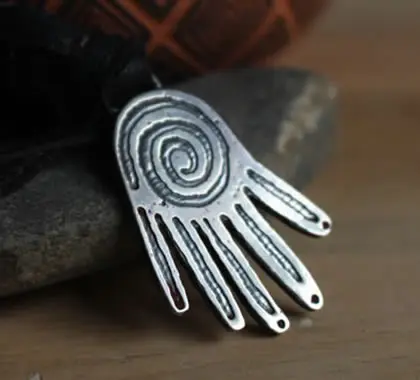 Creative power necklace made from an olmec seal