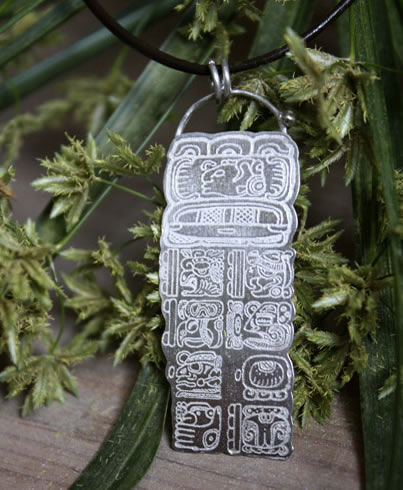 Pendant with the Mayan calendar showing a date calculated with the long count