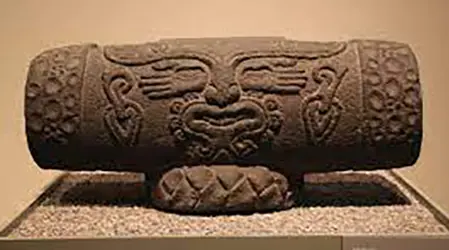 Teponaztli or Aztec drum with the god of music Xochipilli