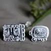 Stud earrings with the date of the Mayan calendar wheel