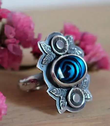 Custom ring with a paua cabochons