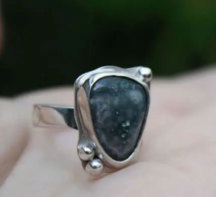 Ring with blue smithsonite gemstone