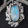 White labradorite or rainbow moonstone characteristics